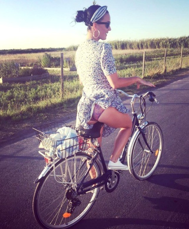 Kate Perry on bike